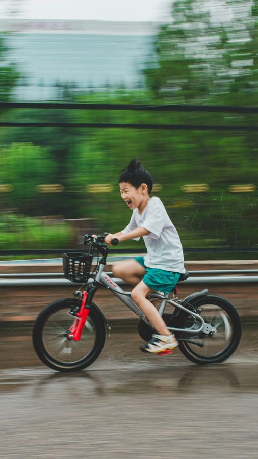 A boy riding a bike