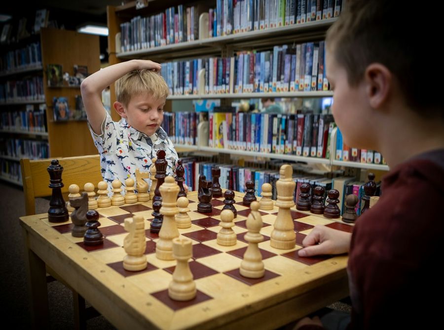 Two boys playing chess
